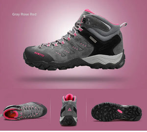 Les HUMTTO - HT-290027B mid-top randonnée bottines pour femme, en gris et noir avec accents roses, sont présentées en angle sur fond blanc. Elles offrent une protection splash-proof et une semelle antidérapante pour plus d'adhérence.