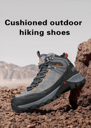 Chaussure de randonnée gris et noir Humtto "HT-250486A" pour homme, avec des accents orange, du cuir véritable, des œillets métalliques, une semelle robuste et la technologie Static Waterproof, montrée de profil sur fond blanc.