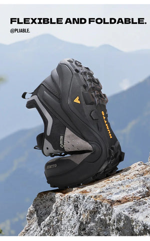 Chaussures de randonnée / trail low-top pour femme "HUMTTO - HT-160560B" grises et blanches en cuir véritable, semelle noire, accents roses, logo Humtto sur le côté et le dessus-idéales pour la randonnée.