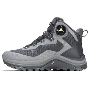 Gris et orange Humtto HT-260587E mid-top bottines alpinisme avec protection Splash-proof, semelle crantée et molette latérale de serrage, présentées sur fond blanc avec logo Humtto. Idéales comme chaussures hydrophobes pour enfants aventuriers.