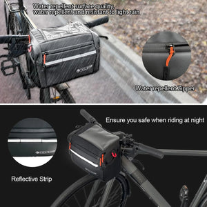 Sacoche de guidon isotherme 4 L Toptrek, noire, imperméable, dotée dune fermeture étanche et dune bande réfléchissante, fixée au vélo.