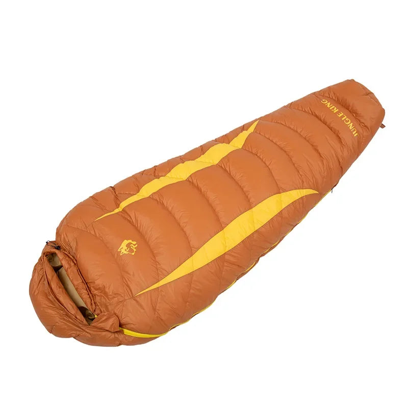 Sac de couchage JUNGLE KING en duvet de canard 650FP, -5 °C, orange et jaune, avec capuche, pour des nuits confortables en plein air.