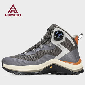 Gris et orange Humtto HT-260587E mid-top bottines alpinisme avec protection Splash-proof, semelle crantée et molette latérale de serrage, présentées sur fond blanc avec logo Humtto. Idéales comme chaussures hydrophobes pour enfants aventuriers.