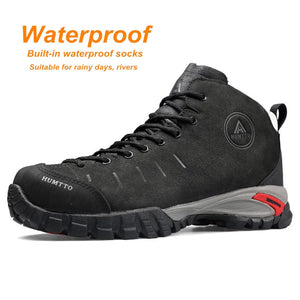 Les Humtto Chaussures de randonnée mid-top "HT-210371A" bottines d'expédition 100% imperméables pour homme offrent une semelle robuste, une adhérence durable et des chaussettes intégrées, idéales pour la pluie ou traverser des rivières.