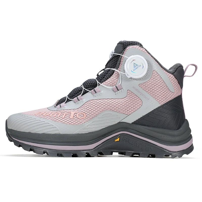 Gris et orange Humtto HT-260587E mid-top bottines alpinisme avec protection Splash-proof, semelle crantée et molette latérale de serrage, présentées sur fond blanc avec logo Humtto. Idéales comme chaussures hydrophobes pour enfants aventuriers.