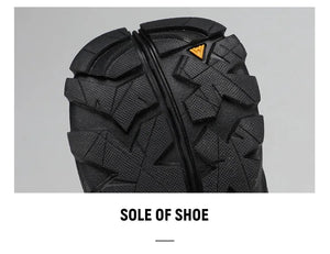 A single Humtto - HT-250366A mid-top randonnée/bottine d'expédition pour homme, gris et noir, antidérapant, protection splash-proof, maintien cheville, lacets, logo Humtto latéral et languette, sur fond blanc.