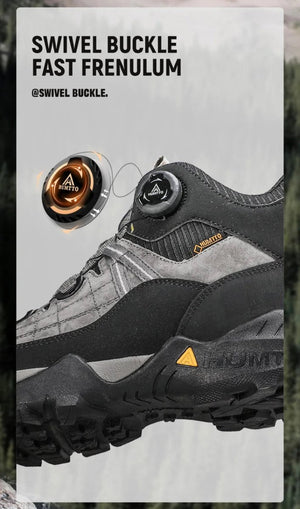 A single Humtto - HT-250366A mid-top randonnée/bottine d'expédition pour homme, gris et noir, antidérapant, protection splash-proof, maintien cheville, lacets, logo Humtto latéral et languette, sur fond blanc.