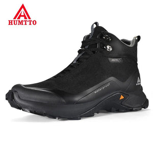 Humtto chaussures de randonnée mid-top pour homme "HT210500A" avec protection splash-proof, semelle robuste, fermeture à lacets et logo de la marque sur fond blanc.