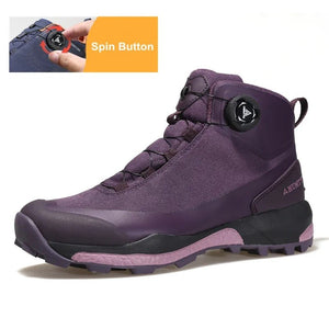 Une chaussure de randonnée pour femmes HUMTTO - HT-220838B violette avec protection contre les éclaboussures, semelle robuste, soutien de la cheville et système de laçage rapide, représentée sur un fond blanc avec le logo Humtto dans le coin supérieur gauche.