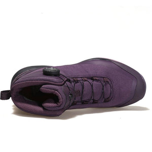 Une chaussure de randonnée pour femmes HUMTTO - HT-220838B violette avec protection contre les éclaboussures, semelle robuste, soutien de la cheville et système de laçage rapide, représentée sur un fond blanc avec le logo Humtto dans le coin supérieur gauche.
