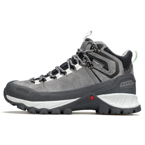 Les Chaussures de randonnée mid-top Humtto HT-250486B pour femme, en cuir véritable gris clair et beige avec accents bleus, semelle robuste et technologie Static Waterproof, idéales comme bottines d'alpinisme imperméables.