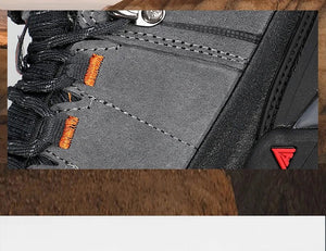 Les Chaussures de randonnée mid-top Humtto HT-250486B pour femme, en cuir véritable gris clair et beige avec accents bleus, semelle robuste et technologie Static Waterproof, idéales comme bottines d'alpinisme imperméables.