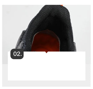 Chaussure de randonnée gris et noir Humtto "HT-250486A" pour homme, avec des accents orange, du cuir véritable, des œillets métalliques, une semelle robuste et la technologie Static Waterproof, montrée de profil sur fond blanc.