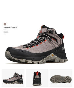 Chaussure de randonnée gris et noir Humtto "HT-250486A" pour homme, avec des accents orange, du cuir véritable, des œillets métalliques, une semelle robuste et la technologie Static Waterproof, montrée de profil sur fond blanc.