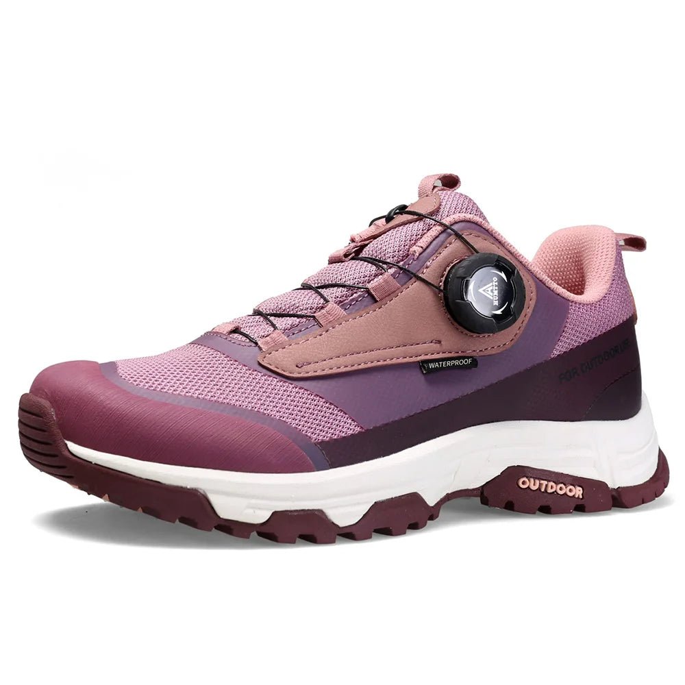 La chaussure de trail/course Humtto "HT-120045B" pour femmes présente une tige en maille rose et violette, une semelle épaisse, une protection contre les éclaboussures et un système de laçage twist-lock, alliant confort élégant et fonctionnalité.