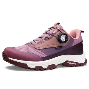La chaussure de trail/course Humtto "HT-120045B" pour femmes présente une tige en maille rose et violette, une semelle épaisse, une protection contre les éclaboussures et un système de laçage twist-lock, alliant confort élégant et fonctionnalité.