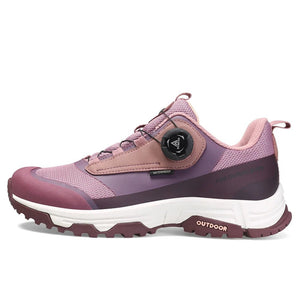 La chaussure de trail/course Humtto "HT-120045B" pour femmes présente une tige en maille rose et violette, une semelle épaisse, une protection contre les éclaboussures et un système de laçage twist-lock, alliant confort élégant et fonctionnalité.