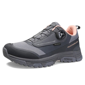 La chaussure de trail/course Humtto "HT-120045B" pour femmes présente une tige en maille rose et violette, une semelle épaisse, une protection contre les éclaboussures et un système de laçage twist-lock, alliant confort élégant et fonctionnalité.
