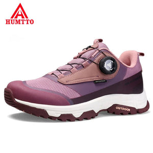 La chaussure de trail/course Humtto "HT-120045B" pour femmes présente une tige en maille rose et violette, une semelle épaisse, une protection contre les éclaboussures et un système de laçage twist-lock, alliant confort élégant et fonctionnalité.