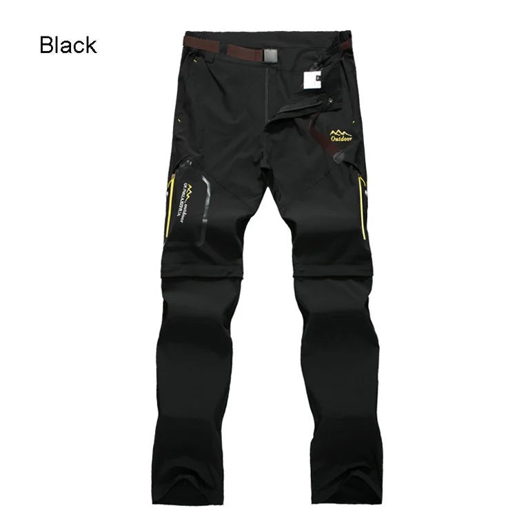Pantalon randonnée homme Trvlwego AD083 noir 2-en-1, short amovible, poches zippées, détails jaunes, fond blanc.