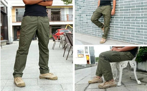 Le pantalon "IDOGEAR - IGPA3213" tactique flexible avec coupe 3D est présenté debout sur fond blanc, avec le logo IDOGEAR en haut à gauche.