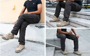 Le pantalon "IDOGEAR - IGPA3213" tactique flexible avec coupe 3D est présenté debout sur fond blanc, avec le logo IDOGEAR en haut à gauche.