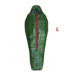 Un sac de couchage vert FLAME'S CREED avec une fermeture éclair rouge, parfait pour les aventures en plein air.