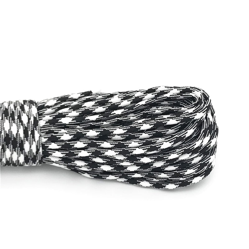 Cordon de parachute 550 à 7 brins 4mm "Loogu – Paracorde bushcraft" - Blanc - noir / 5M | Planète Rando