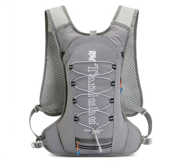 Gilet d'hydratation 12L pour course à pied / trail / marathon 400g "Newboler - Tanluhu " - Gris | Planète Rando