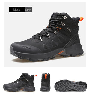 Les chaussures de randonnée montantes pour hommes Humtto "HUMTTO - HT-220463A" sont dotées d'une tige résistante aux éclaboussures et d'une semelle robuste avec des accents orange, soulignant leur design et leur protection imperméable.