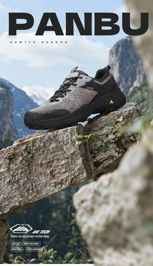 Chaussures de randonnée / trail low-top pour femme "HUMTTO - HT-160560B" grises et blanches en cuir véritable, semelle noire, accents roses, logo Humtto sur le côté et le dessus-idéales pour la randonnée.