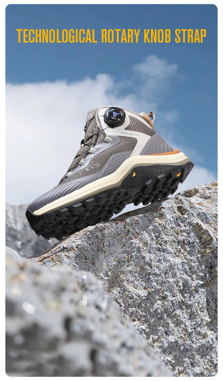 Gris et orange Humtto HT-260587E mid-top bottines alpinisme avec protection Splash-proof, semelle crantée et molette latérale de serrage, présentées sur fond blanc avec logo Humtto. Idéales comme chaussures hydrophobes pour enfants aventuriers.