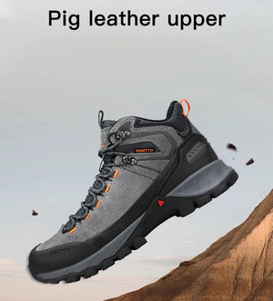 Les Chaussures de randonnée mid-top Humtto HT-250486B pour femme, en cuir véritable gris clair et beige avec accents bleus, semelle robuste et technologie Static Waterproof, idéales comme bottines d'alpinisme imperméables.