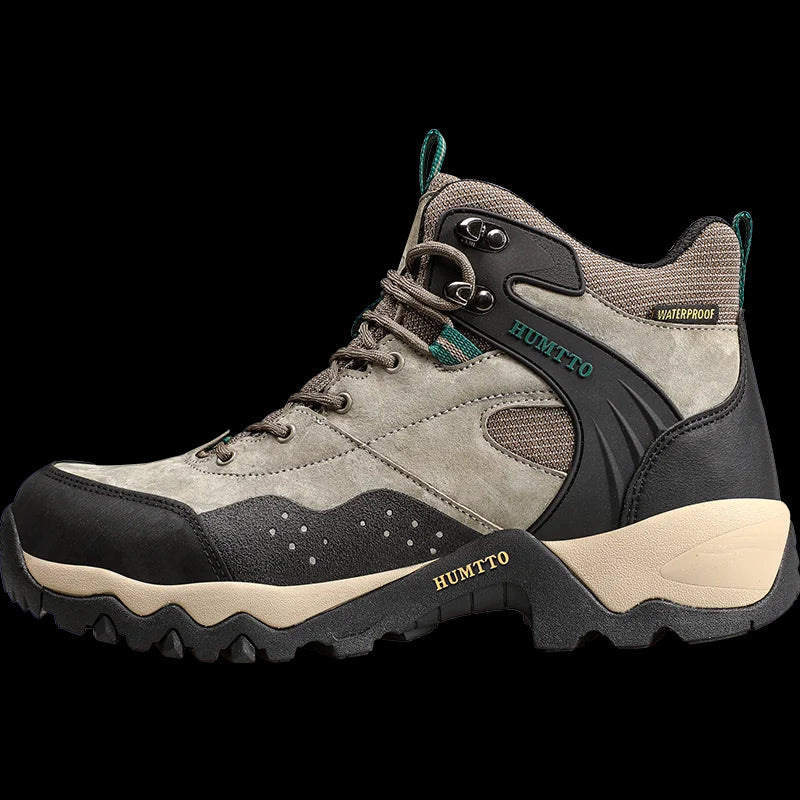 Les chaussures de randonnée mid-top "HUMTTO - HT-210337A" pour homme, 100% imperméables, offrent un design beige et noir, des chaussettes intégrées et des semelles antidérapantes, idéales pour l'expédition et la randonnée outdoor.