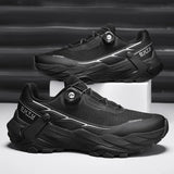 La CHRLCK "CHRLCK - KC-trail" est une chaussure de randonnée imperméable beige et noire pour homme, avec une fermeture à cadran, des lacets noirs et une robuste semelle marron. Chaussures respirantes et imperméables, idéales pour toutes vos aventures.