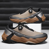 La CHRLCK "CHRLCK - KC-trail" est une chaussure de randonnée imperméable beige et noire pour homme, avec une fermeture à cadran, des lacets noirs et une robuste semelle marron. Chaussures respirantes et imperméables, idéales pour toutes vos aventures.