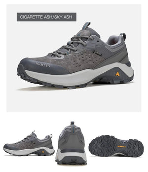 Chaussures de randonnée / trail low-top pour femme "HUMTTO - HT-160560B" grises et blanches en cuir véritable, semelle noire, accents roses, logo Humtto sur le côté et le dessus-idéales pour la randonnée.