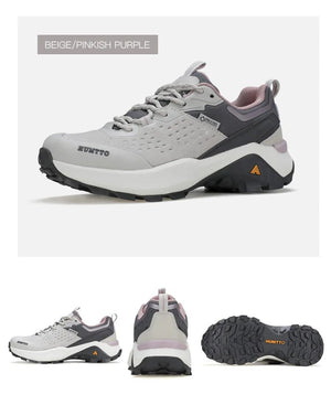 Chaussures de randonnée / trail low-top pour femme "HUMTTO - HT-160560B" grises et blanches en cuir véritable, semelle noire, accents roses, logo Humtto sur le côté et le dessus-idéales pour la randonnée.