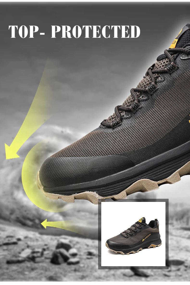Gros plan sur la chaussure de randonnée basse noire HIKEUP HK-15, embout renforcé TOP-PROTECTED, semelle HikGrip, fond rocheux.