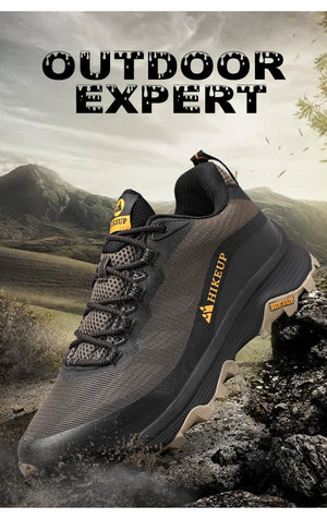 Chaussure de randonnée basse homme HIKEUP HK-15, HikGrip et Splash-proof, sur terrain rocheux, idéale aventures outdoor.