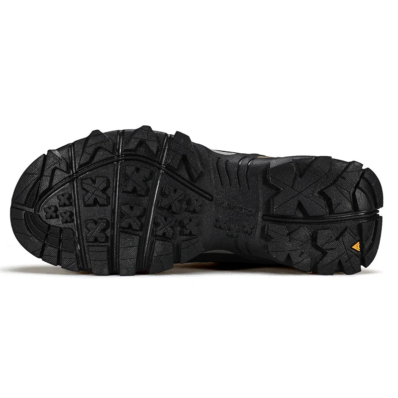 A single Humtto - HT-250366A mid-top randonnée/bottine d'expédition pour homme, gris et noir, antidérapant, protection splash-proof, maintien cheville, lacets, logo Humtto latéral et languette, sur fond blanc.