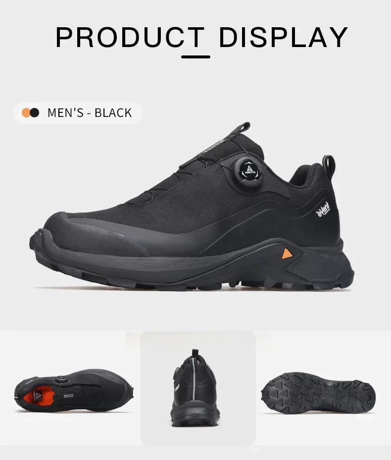 Les Humtto Chaussures de randonnée low-top pour homme "HT-140660A" en gris, dotées d'une semelle robuste, d'un système de laçage à molette et de la Technologie Event® Dynamic Waterproof, sont présentées sur fond blanc.