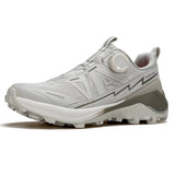 La chaussure HUMTTO - HT-860714A de Planète Rando est une low-top de randonnée bleue avec semelle crantée, midsole blanche et système de laçage à molette, offrant une protection splash-proof et des performances antidérapantes par temps humide.