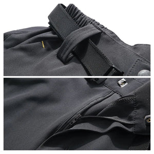 Pantalon de randonnée homme Trvlwego 2 en 1 avec short amovible, ceinture ajustable, braguette zippée et tissu déperlant.