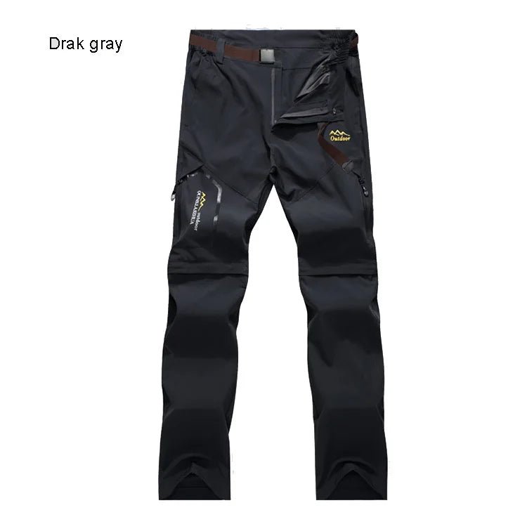 Pantalon de randonnée TRVLWEGO 2 en 1 gris foncé, poches zippées, logo Outdoor, séchage rapide, short amovible.