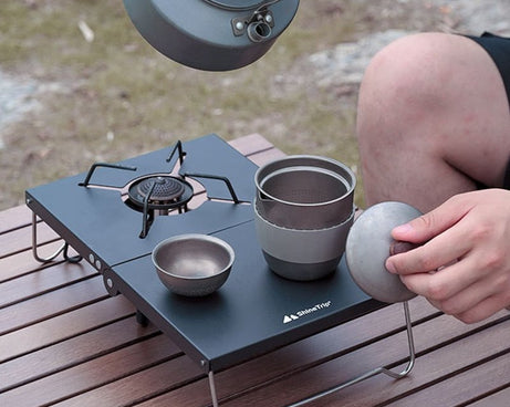 Table de camping portable pour cuisinière à gaz "Into - Shine Trip" - Planète Rando